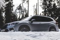 Kostroma, Russia - November 8, 2022: A silver Subaru Forester is standing in a snowdrift. winter and the forest