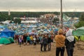 Kostrzyn nad OdrÃâ¦, Poland - July 15, 2016: tents, people and the main stage at the Przystanek Woodstock music festival PolAndRock Royalty Free Stock Photo