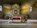 Koszecin, Poland, January 4, 2024: Interior of the old wooden church of the Holy Trinity in Koszecin, Poland. Main altar with Royalty Free Stock Photo