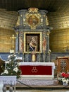 Koszecin, Poland, January 4, 2024: Interior of the old wooden church of the Holy Trinity in Koszecin, Poland. Main altar with Royalty Free Stock Photo