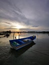 fisherman boat during sunset at Kampung Gayang
