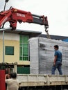 Photo of lorry crane operator.