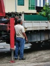 Photo of lorry crane operator.