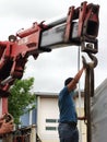 Photo of lorry crane operator. Royalty Free Stock Photo