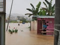 Outdoor scenery during raining season with flash flood at Menggatal Road.