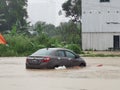 Outdoor scenery during raining season with flash flood at Menggatal Road. Royalty Free Stock Photo