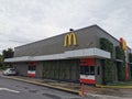 Outdoor scenery McDonald`s restaurant drive through area. Royalty Free Stock Photo