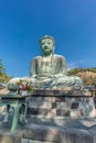 Wide angle side view of The Great Buddha (Daibutsu) of Kamakura, Japan