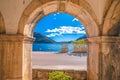 Kotor bay landscape through historic architecture arch