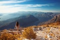 Kotor bay. Montenegro. Romantic Woman on bench above Landscape o