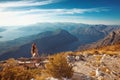 Kotor bay. Montenegro. Romantic Woman on bench above Landscape o