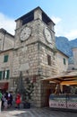 Kotor city, Montenegro, June, 24, 2015, Tourists walking in ancient Kotor on Plaza de Armas near the Clock tower, Old town, Kotor, Royalty Free Stock Photo