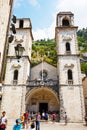 Kotor, Montenegro - August 10, 2015: Saint Tryphon cathedral with tourists in the old town of Kotor, Montenegro.