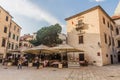 KOTOR, MONTENEGRO - JUNE 1, 2019: Open air restaurant at Pjaca Sv. Tripuna square in the Old Town of Kotor, Montenegr Royalty Free Stock Photo