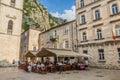 KOTOR, MONTENEGRO - JUNE 1, 2019: Open air restaurant at Pjaca Sv. Tripuna square in the Old Town of Kotor, Montenegr Royalty Free Stock Photo