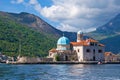 Kotor, Montenegro - October 2017 ; Tourist visiting Our Lady of the Rock Church in Kotor, Montenegro