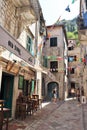 Kotor, Montenegro - 8/6/2019; Tourists walking along stone streets in Kotor, Montenegro