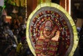 Theyyam artist perform during temple festival.