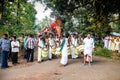 Many indian drummers play national drums walking by indian village on annual festival