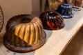 Kougelhopf dishes on a shelf in Alsace,