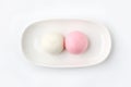 kouhaku manjyu Japanese traditional confectionery cake wagashi on plate isolated on white background Royalty Free Stock Photo