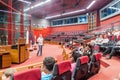 KOUROU, FRENCH GUIANA - AUGUST 4, 2015: Tour guide and tourists at Jupiter control center at Centre Spatial Guyanais