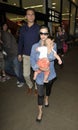 Kourtney Kardashian with baby and husband at LAX Royalty Free Stock Photo