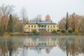 Kouvola, Finland - 15 October 2019: Autumn landscape with beautiful wooden Rabbelugn Manor - Takamaan Kartano. Wrede family house