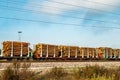 Kouvola, Finland - 24 September 2020: Railway carriages with timber at paper mill Stora Enso