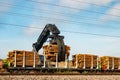 Kouvola, Finland - 24 September 2020: Unloading of timber from railway carriages at paper mill Stora Enso Royalty Free Stock Photo