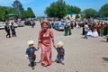 Kov-Ata, Turkmenistan - April 30, 2017: Mother with two children