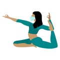 KOVID-19 prevention. Beautiful athletic girl in a mask does yoga at home