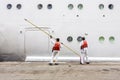 Worker renovate the ship`s side