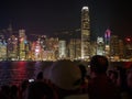 Large groups of people gather at the pier of Kownloon to admire the spectacle A Symphony Royalty Free Stock Photo