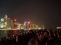 Large groups of people gather at the pier of Kownloon to admire the spectacle A Symphony Royalty Free Stock Photo