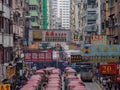 A view of the busy Tung Choi street with its many billboards in Hong Kong Royalty Free Stock Photo