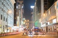 Night long exposure of passing vehicles on busy city street. Royalty Free Stock Photo