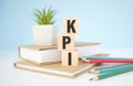 KPI, Key Performance Indicator text on wooden cubes on office table for company Royalty Free Stock Photo