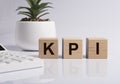 KPI word on cubes. Key performance indicator Royalty Free Stock Photo
