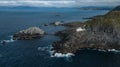 Kraakenes lighthouse on rocky beach, in Vaagsoy, Norway 2018