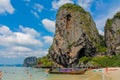 Krabi Ao Nang, Railay beach longtail boats on sand in Thailand