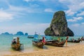 Krabi Ao Nang, Railay beach longtail boats on sand in Thailand