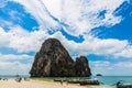 Krabi, Phranang Beach, Thailand - February 12, 2019: PhraNang Cave Beach in andaman sea. Sandy beach with tourists and long-tail