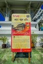 KRABI, THAILAND - FEBRUARY 19, 2018: Close up of informative sign at the enter of white temple, Wat Kaew Korawaram. This