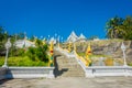 KRABI, THAILAND - FEBRUARY 19, 2018: Naga staircase at Wat Kaew Korawararam public white temple, church in THAILAND