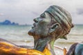 Krabi Thailand July 2018. Article catching marlin on the beaches of Ao Nang. Part of the sculpture of a fisherman`s head against