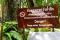 Krabi, Thailand - July 18, 2016: Warning Label - Danger Deep Water Do not Swim in Waterfall Than Bok Khorani National Park.