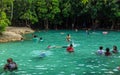 Emerald crystal blue water pool in Thailand, citizens and tourists swiming