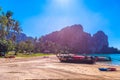 KRABI, THAILAND- MARCH 2018: Long tail boats on tropical beach with palms, Tonsai Bay, Railay Beach, Ao Nang, Krabi, Thailand Royalty Free Stock Photo