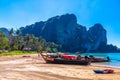 KRABI, THAILAND- MARCH 2018: Long tail boats on tropical beach with palms, Tonsai Bay, Railay Beach, Ao Nang, Krabi, Thailand Royalty Free Stock Photo